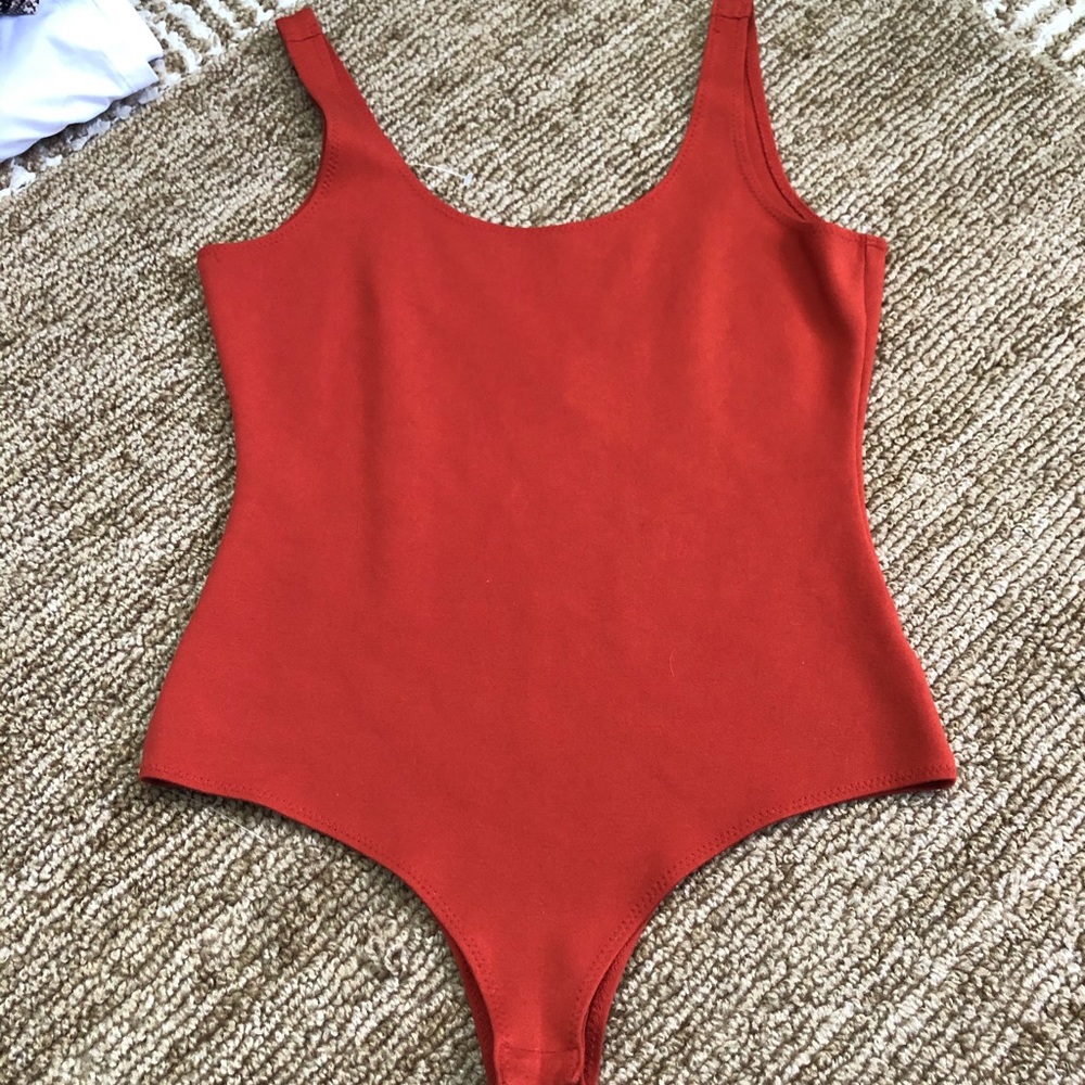 NWB Orange Bodysuit